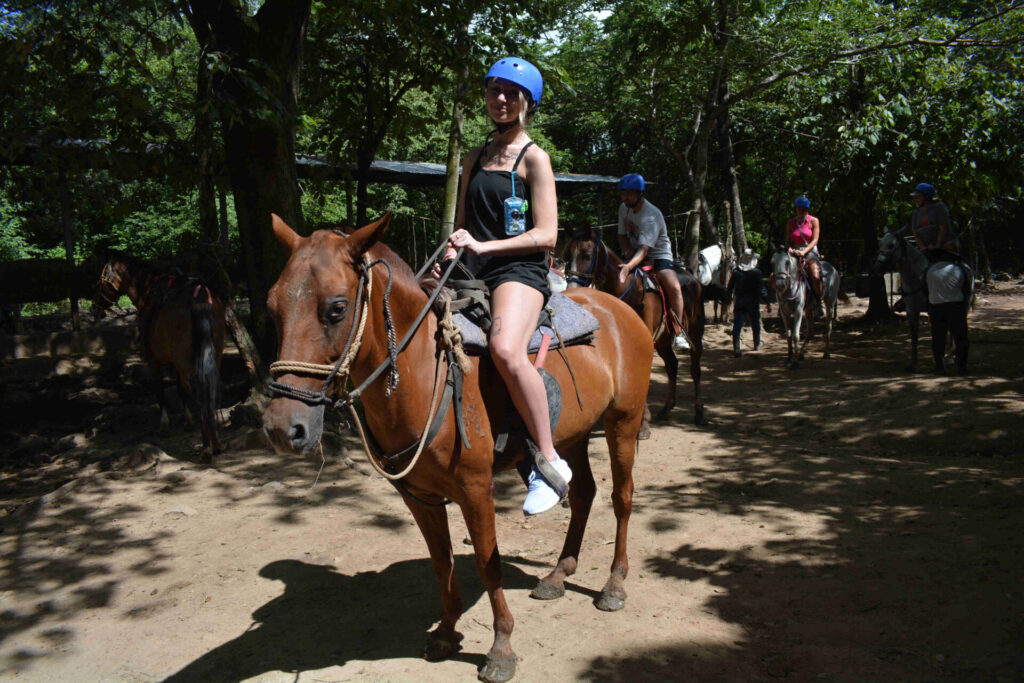 Girl on Horseback 2Cañon de la Vieja Getting ready for Horsebackride Brasilito Tours Reserva Conchal
